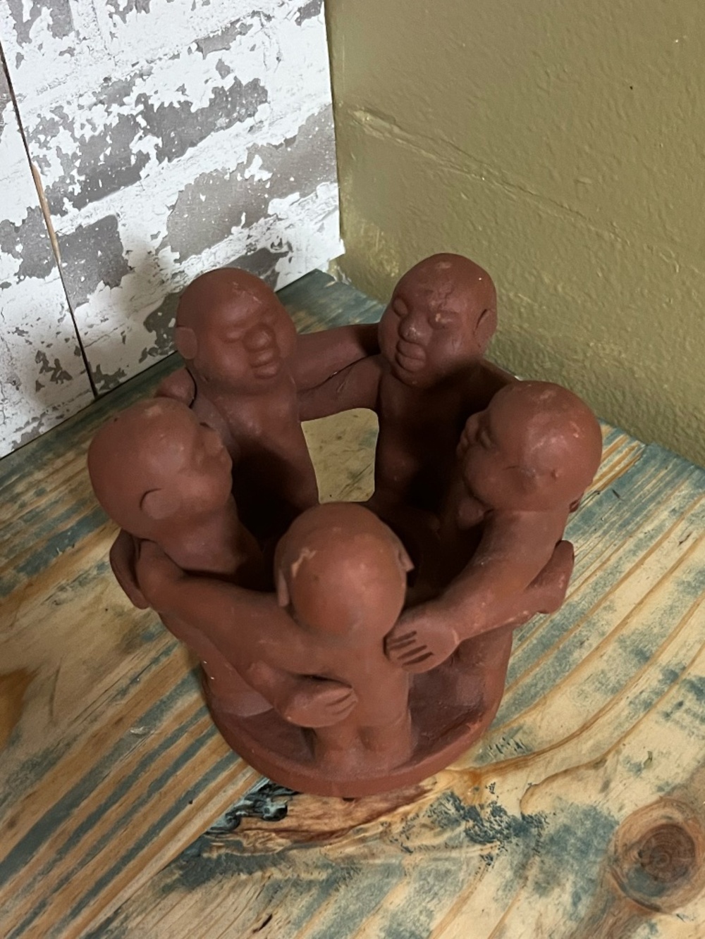 Terracotta "Circle of Friends" folk art pottery sculpture, tea light candle hold
